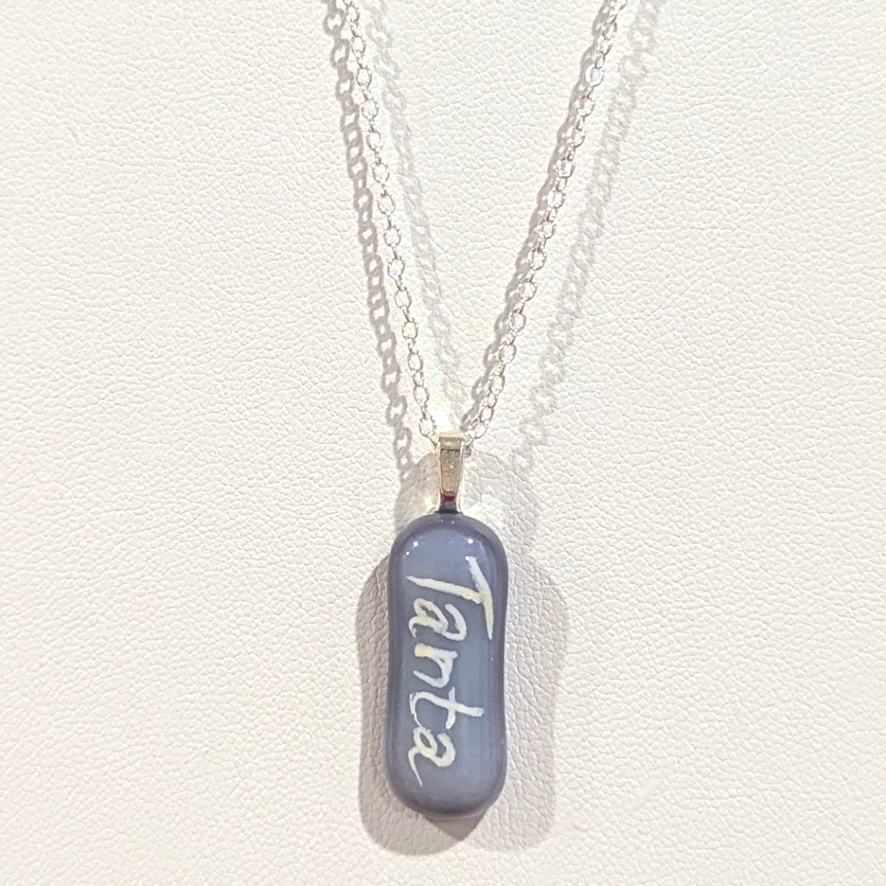 Hand crafted artisan made grey glass Tanta/ Aunt in yiddis handwritten necklace.